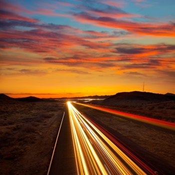 Arizona sunset at Freeway 40 with cars light traces USA