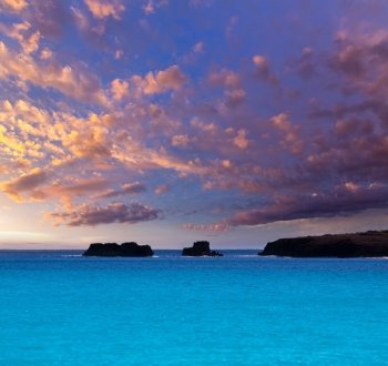 Menorca Son Saura beach sunset in Ciutadella turquoise color at Balearic islands