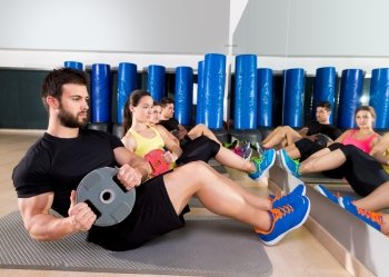 Abdominal plate training core group at gym fitness workout