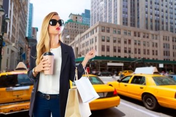 Blond girl shopaholic in Manhattan New York shopping with coffee Photomount