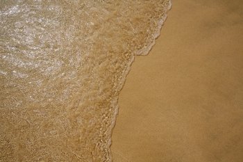 Beach water and sand texture background in Canary Islands