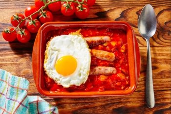 Tapas pisto con tomate ratatouille egg and sausage from Spain