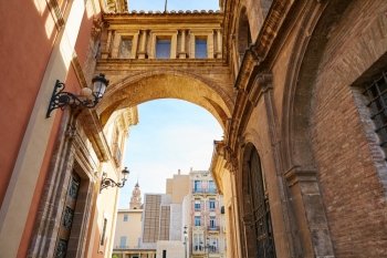 Valencia Plaza Virgen square with cathedral arch in Spain