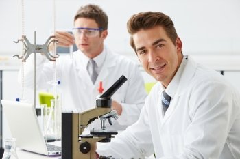 Technicians Carrying Out Research In Laboratory