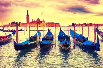 Gondolas at sunset near the Piazza San Marco, Venice, Italy. Colorized like instagram filter