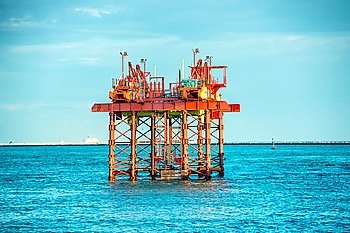 Oil drilling platform offshore in the sea