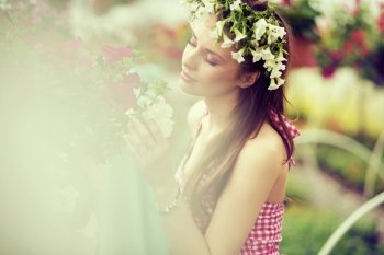 Charming woman with the flower hat