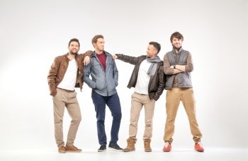Group of smart guys advertising clothes