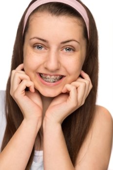 Smiling girl with braces teenager beauty on white background