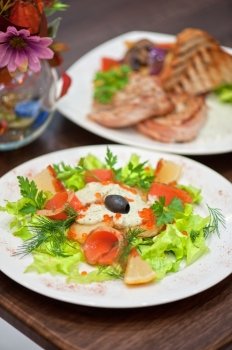 salad with smoked salmon . vegetable salad with smoked salmon 