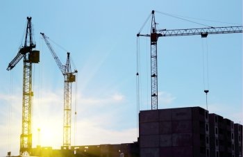  crane and blue sky on building site