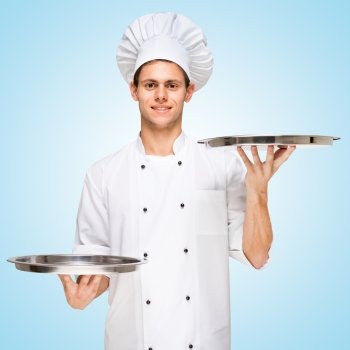 Restaurant chef serving a copy space for menu with prices on a tray.