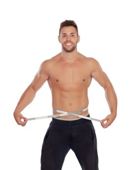 Muscled man with tape measure isolated on a white background
