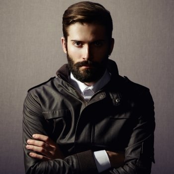 Portrait of handsome man with beard. Fashion photo