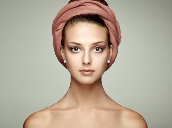 Portrait young beautiful brunette woman with elegant headdress. Beauty fashion. Eyelashes. Cosmetic Eyeshadow. Hair