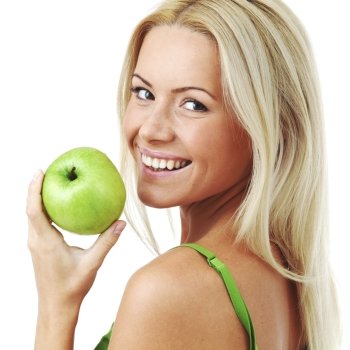 Young smiling woman hold green apple, isolated on white