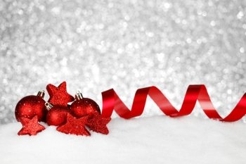 Beautiful red christmas decor on snow