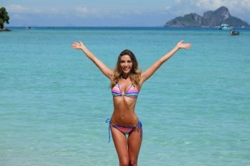 Sexy woman on beach. Sexy woman in bikini on beach in Thailand