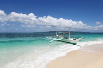 Boat on beach. Boat on beach and tropical sea of Philippines at sunny day