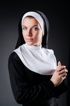 Young nun in religious concept