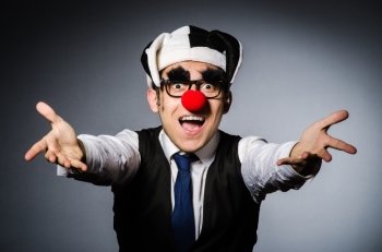 Clown businessman in funny concept