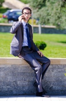 Young businessman at the street scene