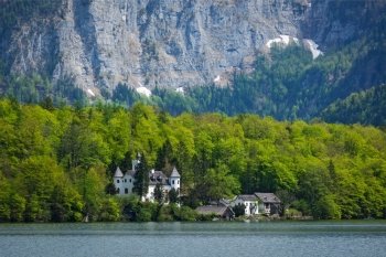 Castle at Hallstatter See mountain lake in Austria. Salzkammergut region, Austria