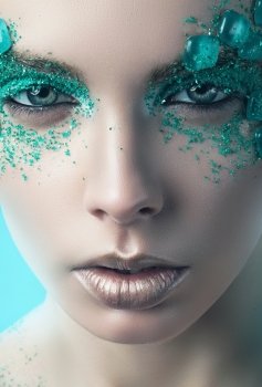 close-up portrait of turquoise woman