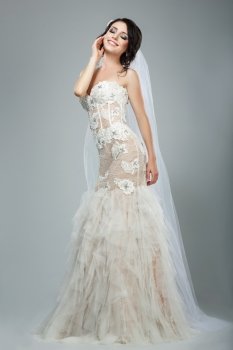 Dreaminess. Full Length of Happy Bride with Closed Eyes in Sleeveless White Dress