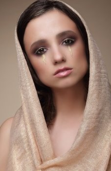 Woman in Shawl with Dramatic Stagy Makeup