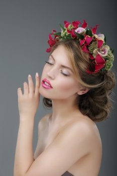 Sensuality. Luxurious Female with Classic Wreath of Flowers