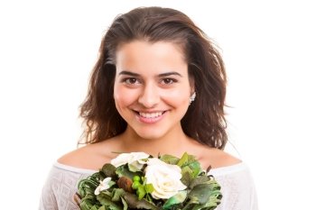 Very happy woman holding a bunch of flowers