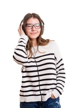 Young woman listening to music, isolated over white