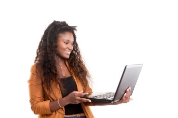 Young african student working with her laptop, isolated over a white background