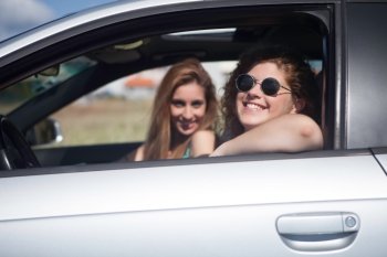 Young happy women leaving for vacations