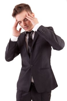 Business man with headache, isolated in white background