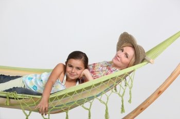 Mother and daughter in hammock