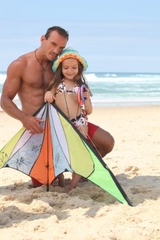 Father and daughter with kite
