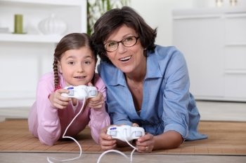 Mother and daughter playing games