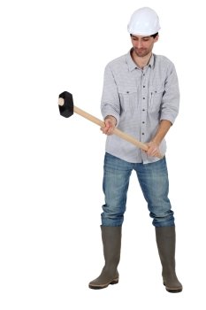 Tradesman holding a mallet