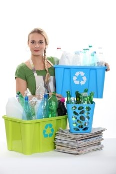 Blond woman recycling