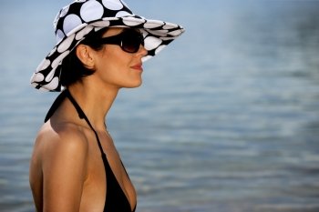 Profile of brunette at the seaside