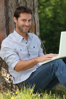 Man sitting with laptop