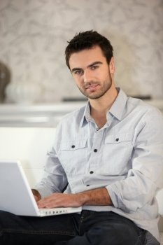 man working on his laptop