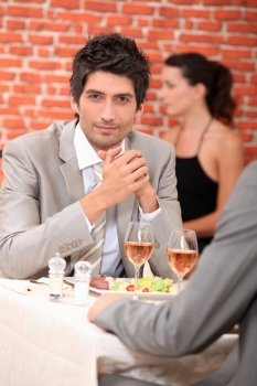 Men eating in a restaurant