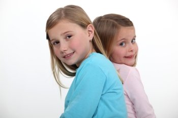 two little girls posing together
