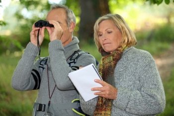 Couple with binoculars