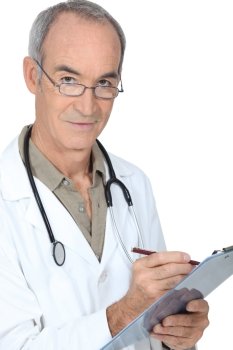 Medical professional writing on a clipboard