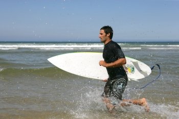 surfer in profile running