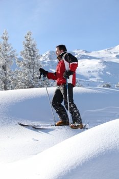 Man skiing on a sunny day